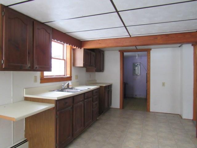 303 Lemmon Hollow Road Kittanning, PA 16201 - Photo 12 of 17 a kitchen with sink a window and cabinets