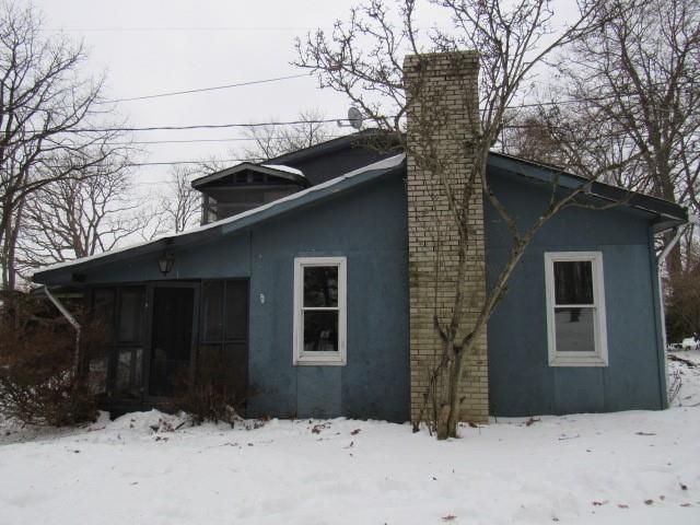 303 Lemmon Hollow Road Kittanning, PA 16201 - Photo 3 of 17 a view of house with yard and large tree