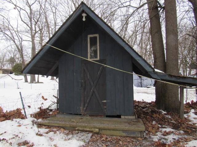 303 Lemmon Hollow Road Kittanning, PA 16201 - Photo 4 of 17 a backyard of a house with large trees