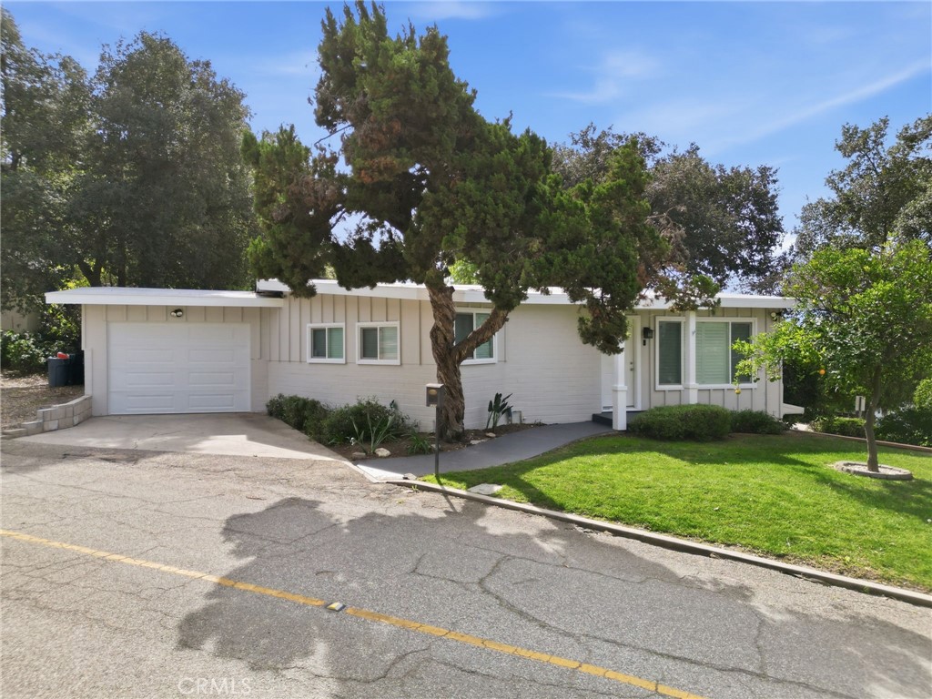 3370 Pachappa Hill Riverside, CA 92506 - Photo 1 of 36 front view of a house with a yard and a street