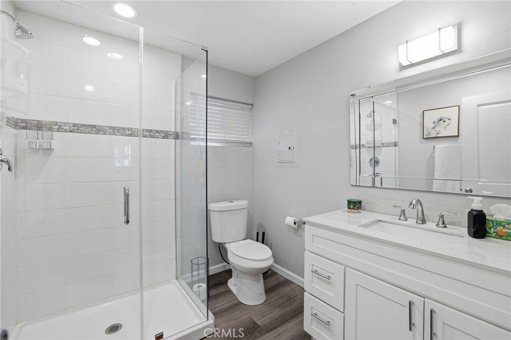 3370 Pachappa Hill Riverside, CA 92506 - Photo 18 of 36 a bathroom with a sink a toilet and shower