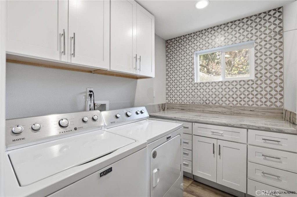 3370 Pachappa Hill Riverside, CA 92506 - Photo 19 of 36 a utility room with dryer and washer