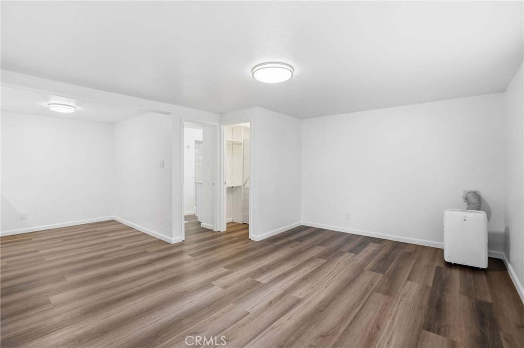 3370 Pachappa Hill Riverside, CA 92506 - Photo 23 of 36 a view of an empty room with wooden floor