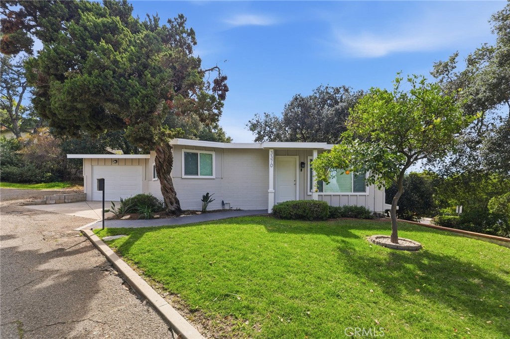 3370 Pachappa Hill Riverside, CA 92506 - Photo 5 of 36 front view of a house with a yard and trees