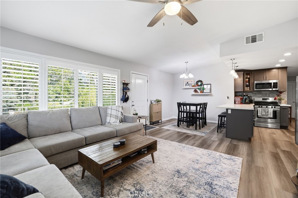 3370 Pachappa Hill Riverside, CA 92506 - Photo 8 of 36 a living room with furniture and a large window