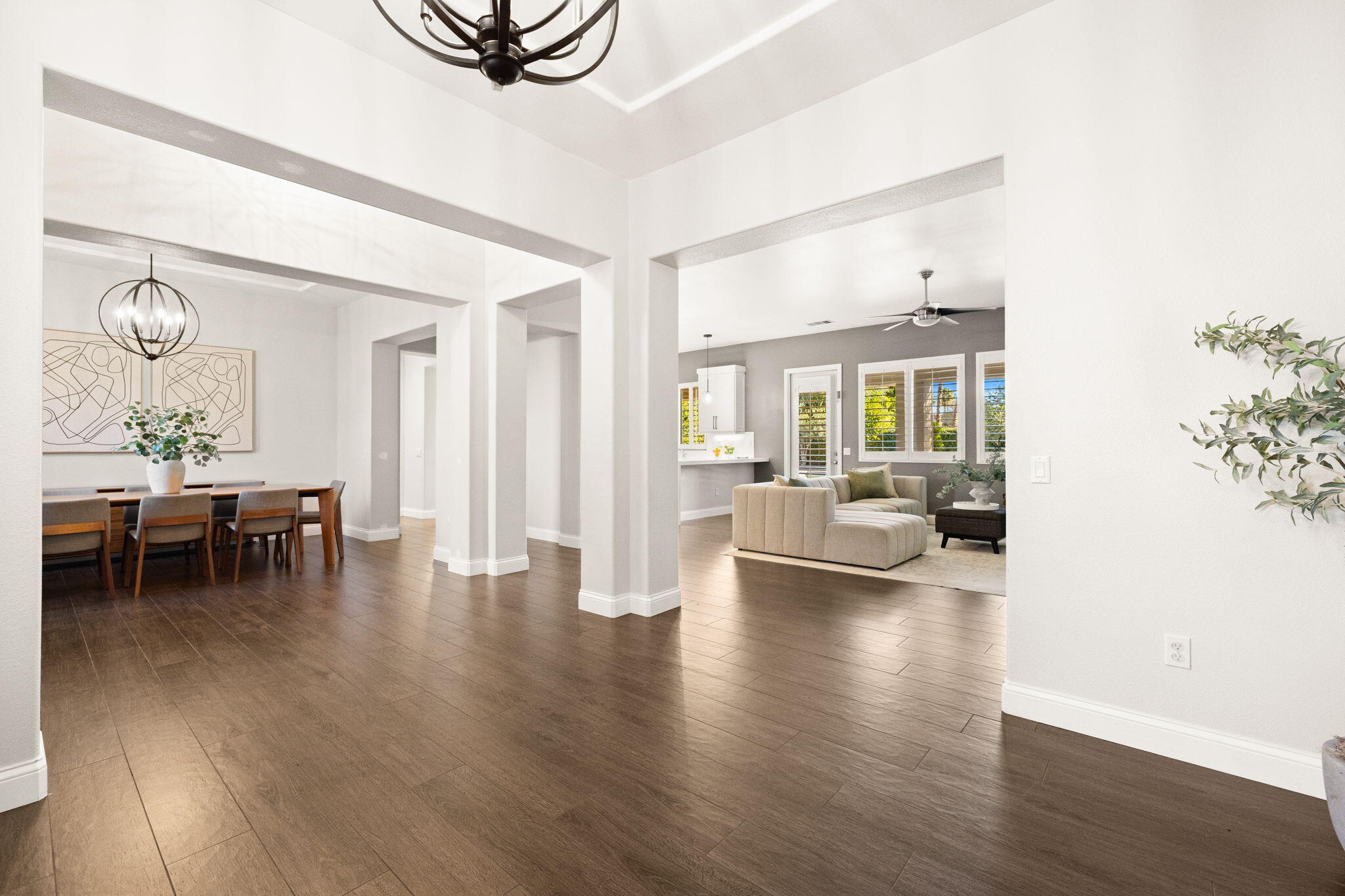 48864 Pear Street Indio, CA 92201 - Photo 11 of 46 a living room with furniture and a wooden floor