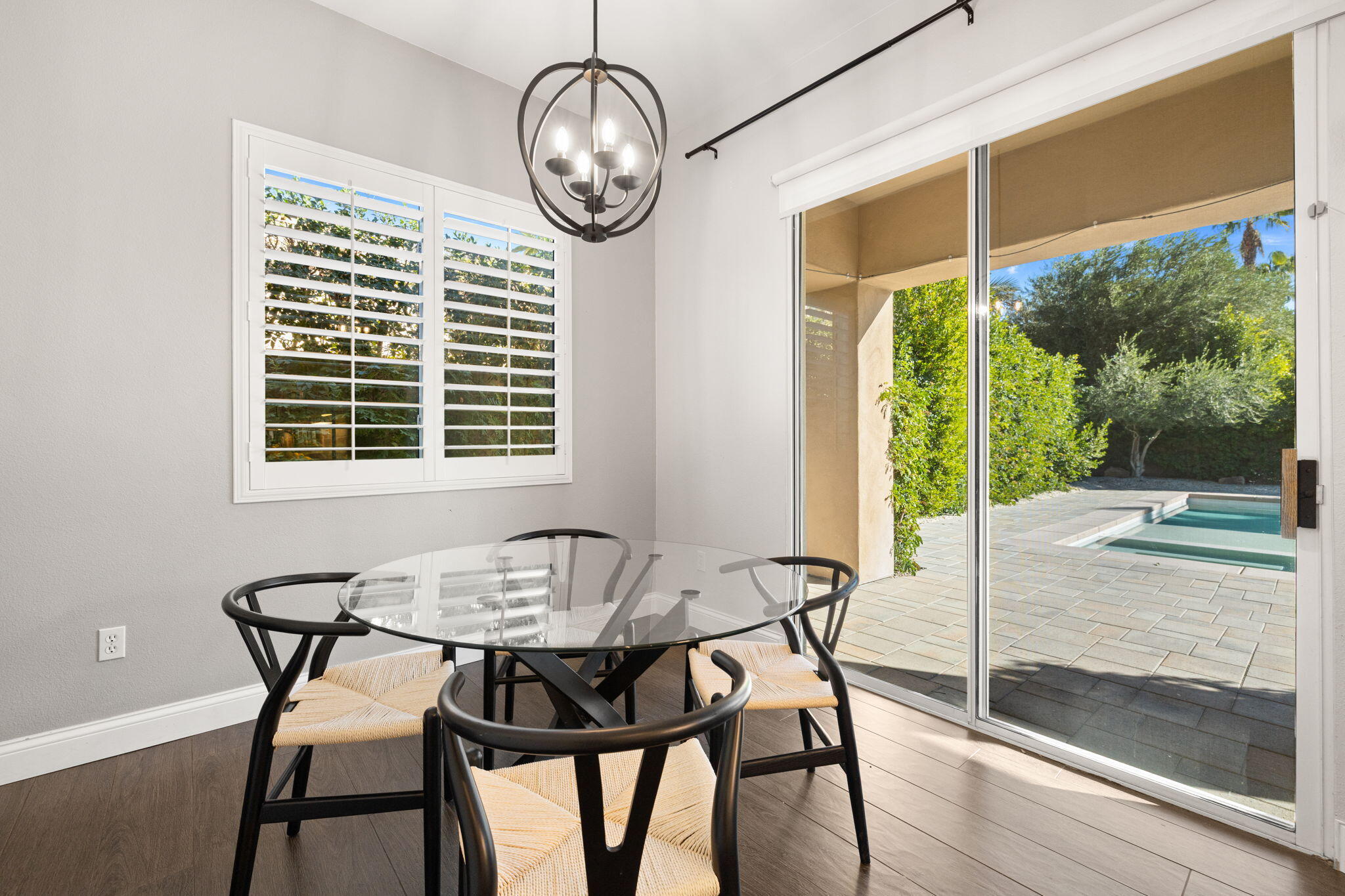 48864 Pear Street Indio, CA 92201 - Photo 18 of 46 a view of a dining room with furniture window and outside view