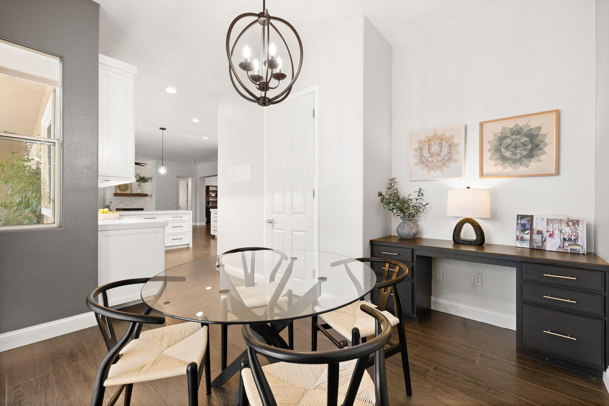 48864 Pear Street Indio, CA 92201 - Photo 19 of 46 a view of a dining room with furniture and wooden floor