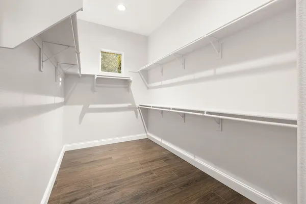 a view of an empty walk in closet