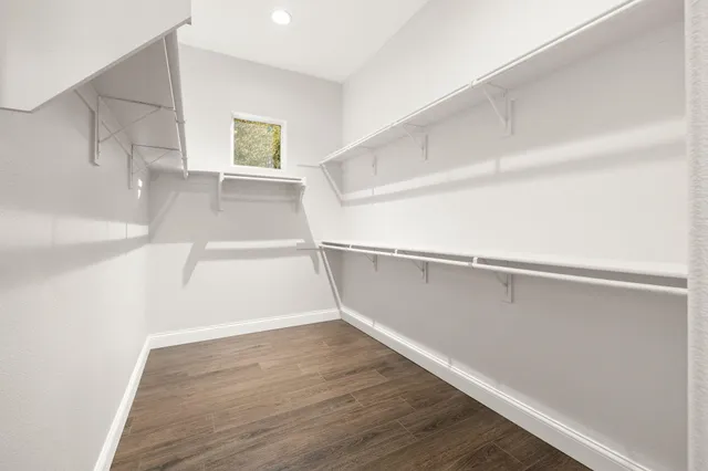 a view of an empty walk in closet