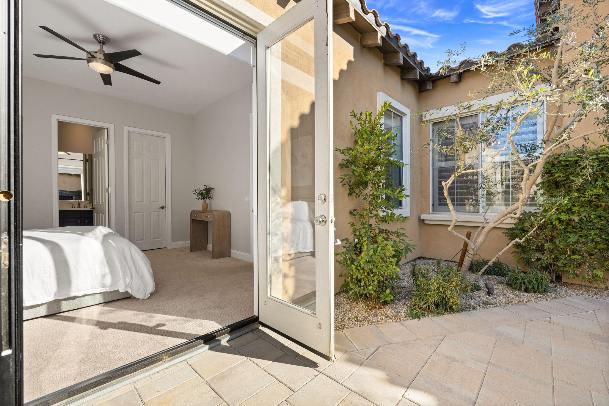 48864 Pear Street Indio, CA 92201 - Photo 25 of 46 a front view of a house with entryway