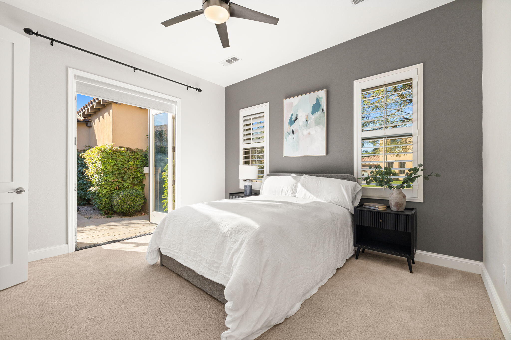 48864 Pear Street Indio, CA 92201 - Photo 27 of 46 a bedroom with a bed and a window