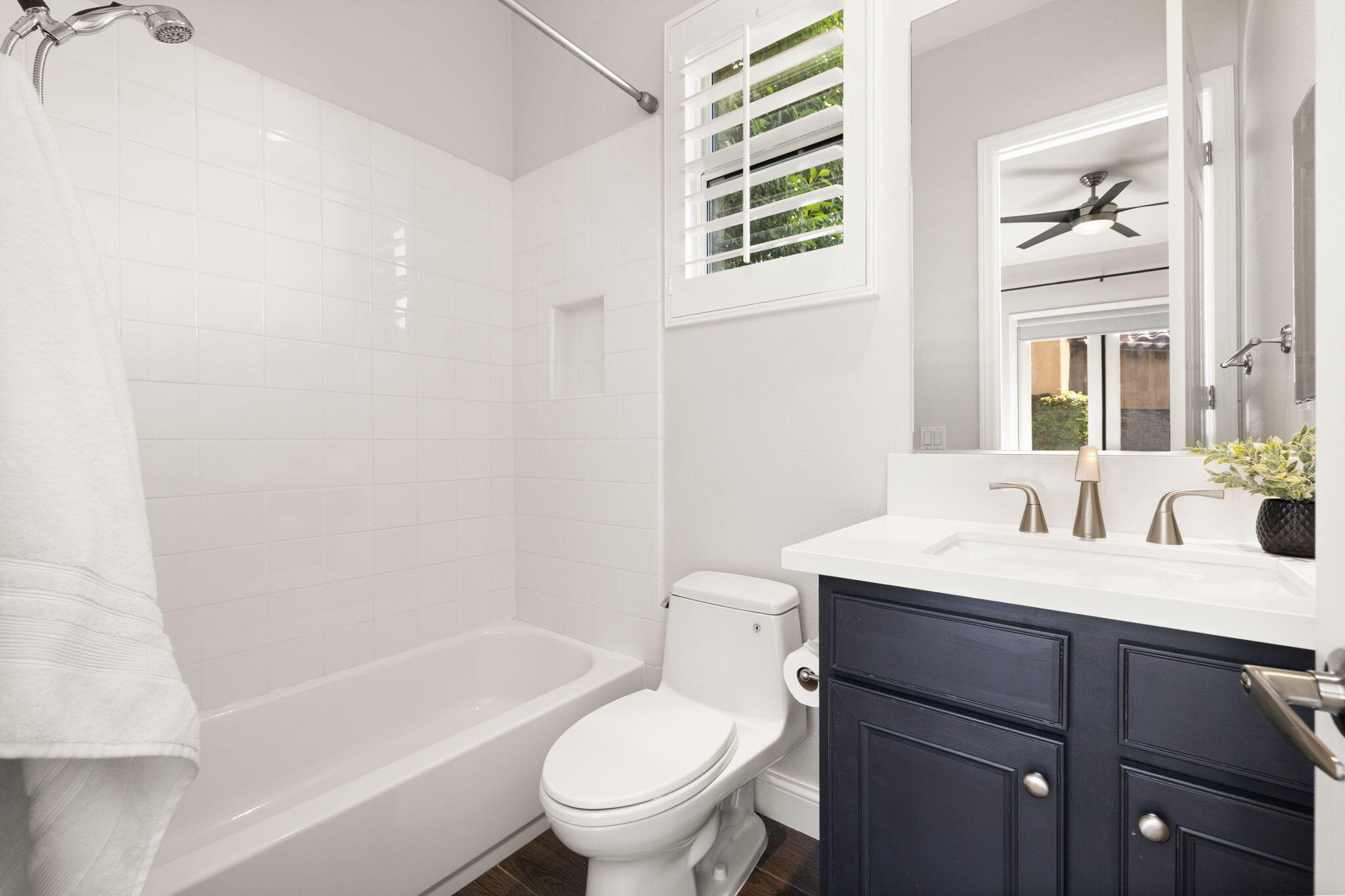 48864 Pear Street Indio, CA 92201 - Photo 28 of 46 a bathroom with a sink toilet vanity tub and shower