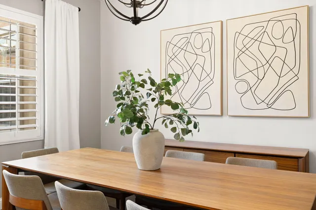 a view of a vase of flowers sitting on a table