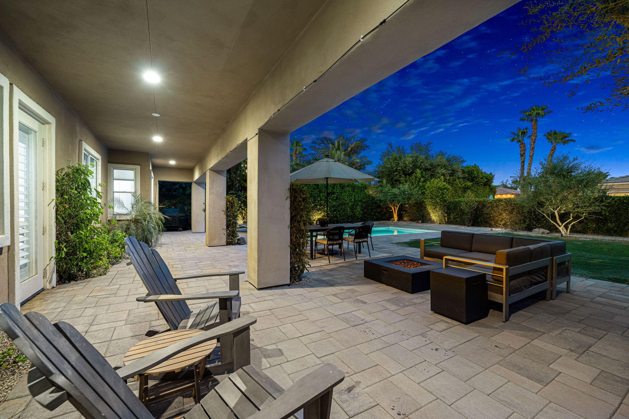 48864 Pear Street Indio, CA 92201 - Photo 43 of 46 a view of a patio with couches and potted plants