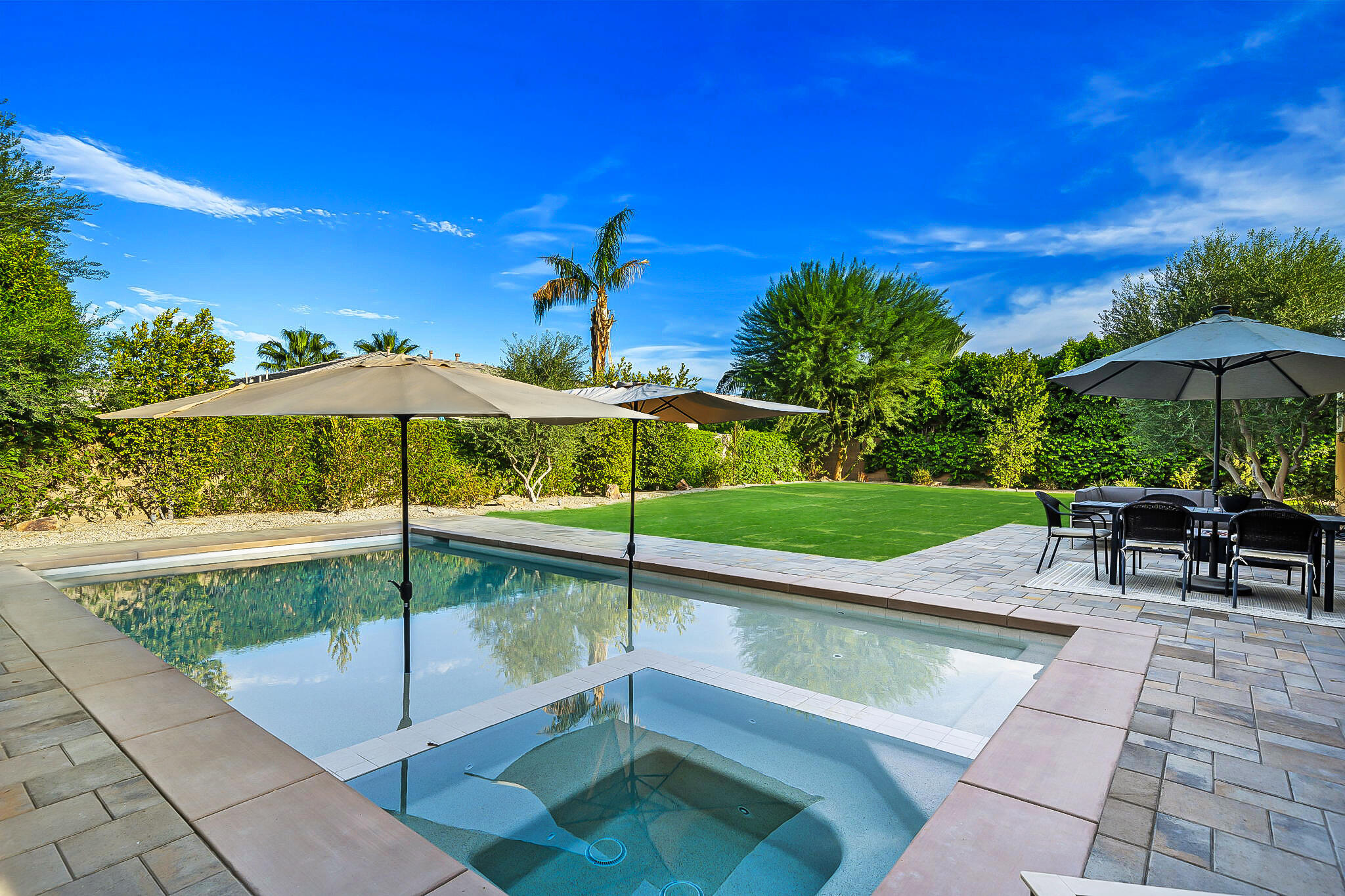 48864 Pear Street Indio, CA 92201 - Photo 46 of 46 a view of a swimming pool with a patio