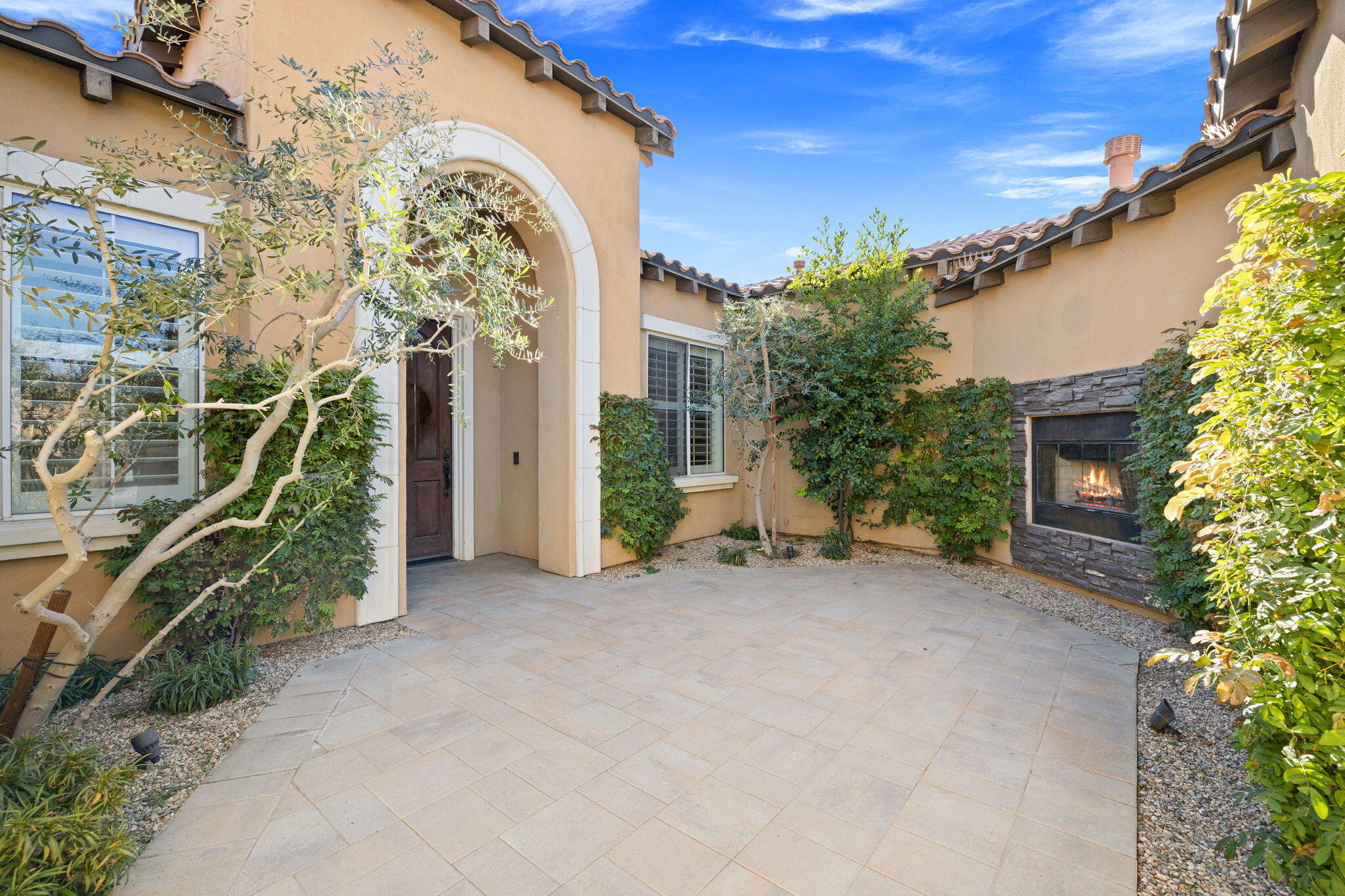 48864 Pear Street Indio, CA 92201 - Photo 6 of 46 a view of a house with a porch
