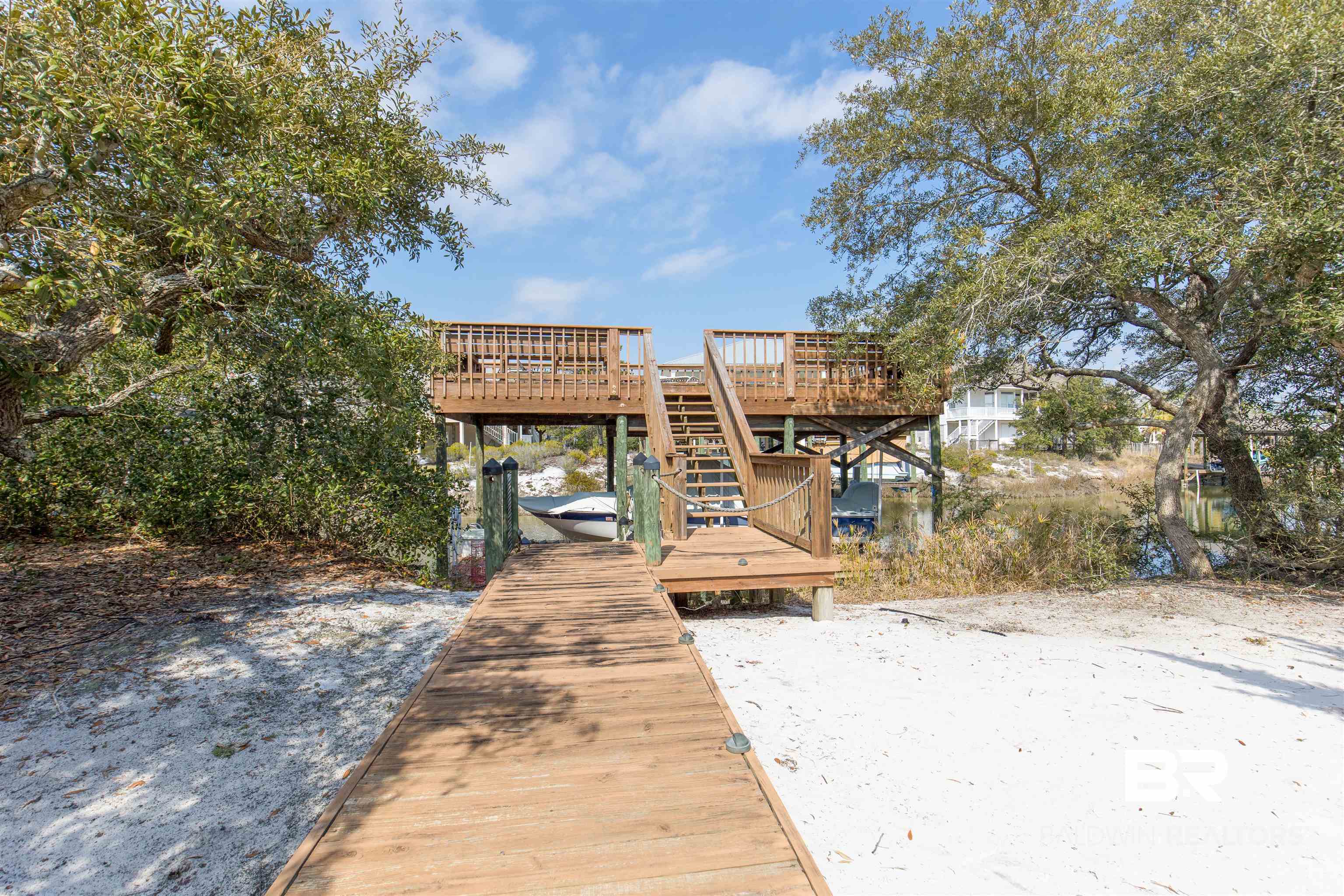 32191 River Road Orange Beach, AL 36561 - Photo 27 of 46 Dock area with a deck