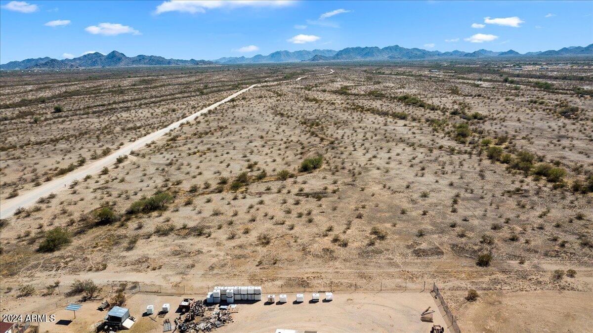 Xxxx Butterfly Road, Unit 1 Buckeye, AZ 85326 - Photo 5 of 20 a view of an ocean beach and mountain