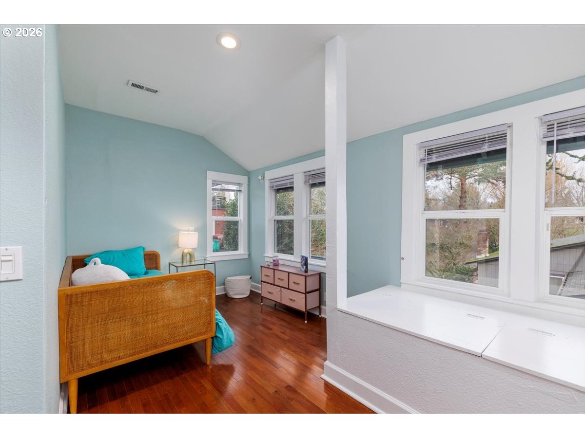 3827 Southwest Dolph Court Portland, OR 97219 - Photo 14 of 48 a living room with furniture and a window