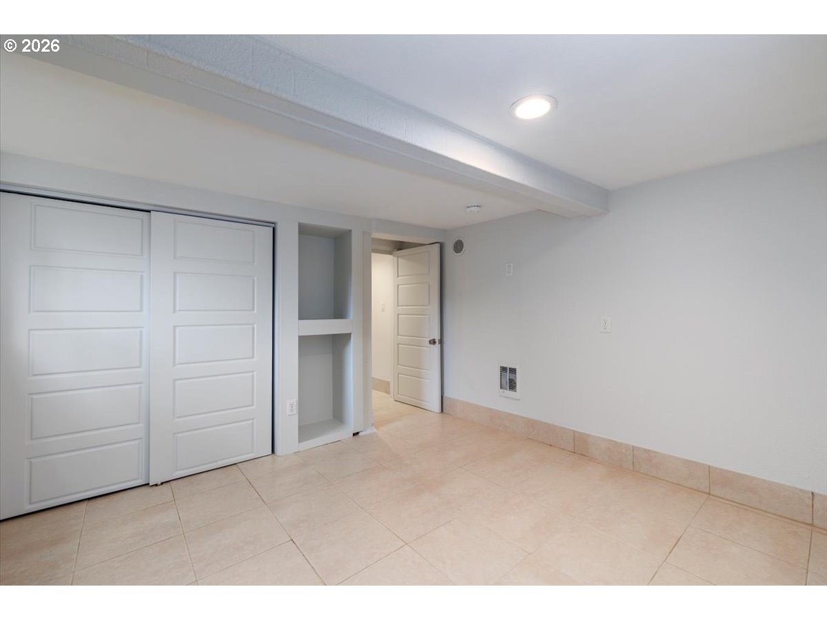 3827 Southwest Dolph Court Portland, OR 97219 - Photo 42 of 48 a view of an empty room