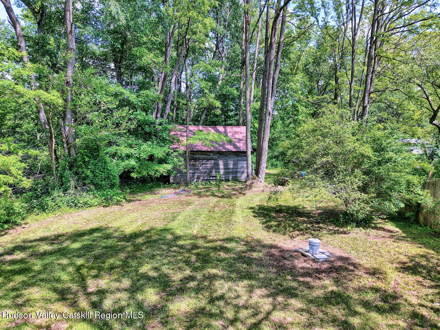 360 Stone Bridge Rd Extension East Durham, NY 12423 - Photo 62 of 83 a backyard of a house with yard and trampoline