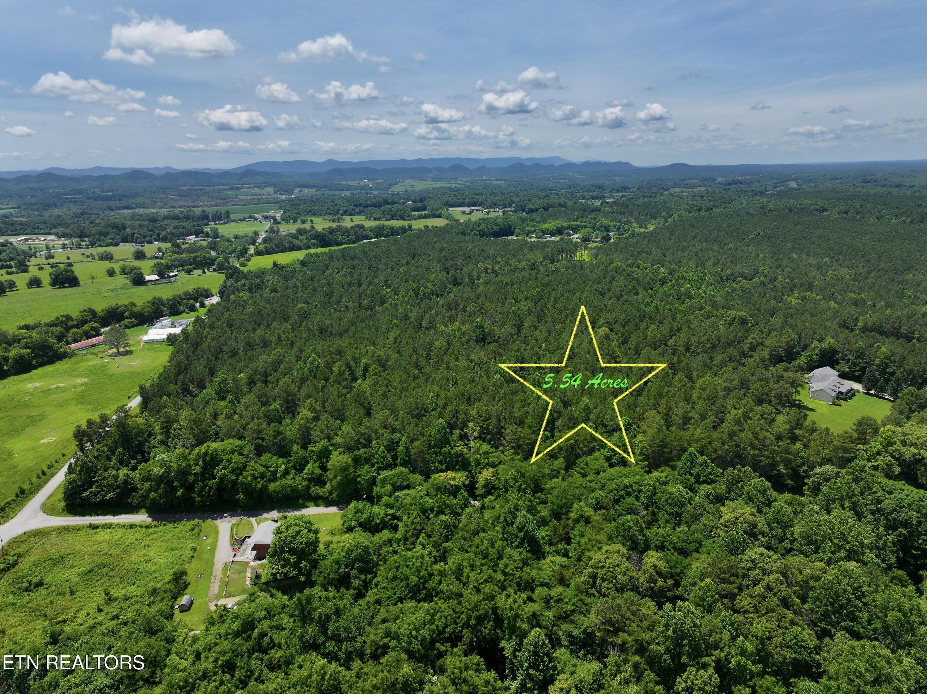 545 Ridge Road Madisonville, TN 37354 - Photo 2 of 7 dji_fly_20260622_055042_0749_17820945327