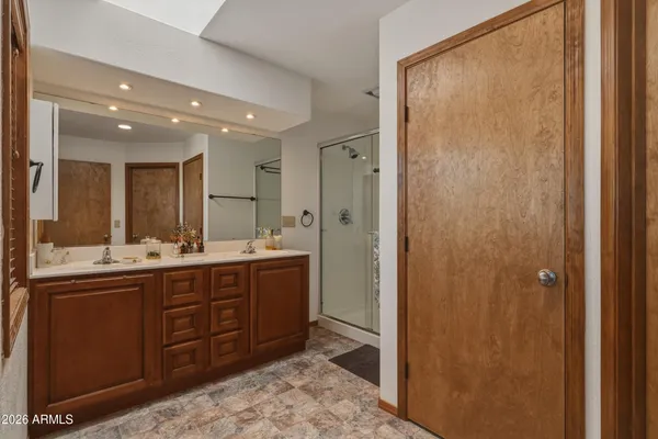 a kitchen with a sink and a window