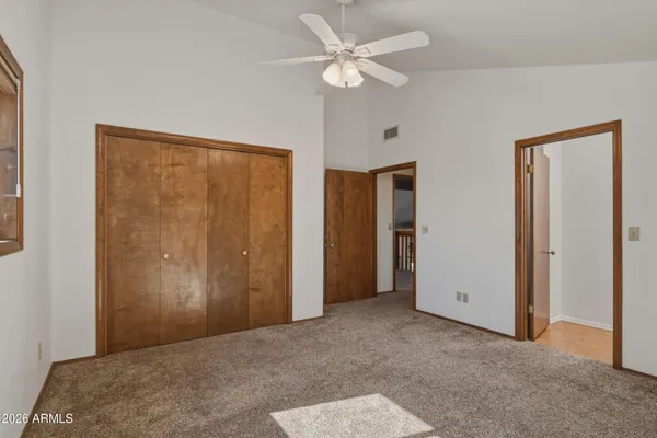 a view of a city with a house in a yard