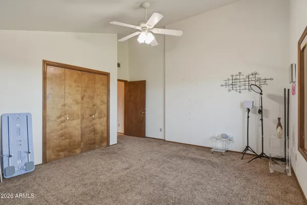 a view of a big room with windows