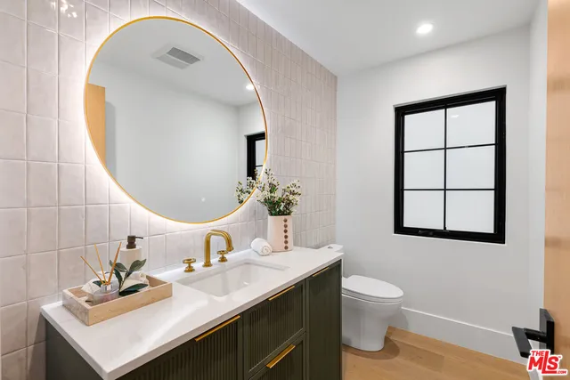 a view of city from a table and chairs in patio