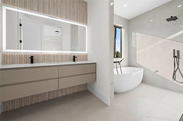 a bathroom with a sink and a bathtub