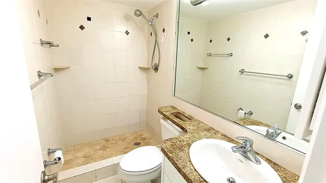 a view of a balcony with table and chairs