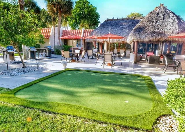 a view of tall building with large windows
