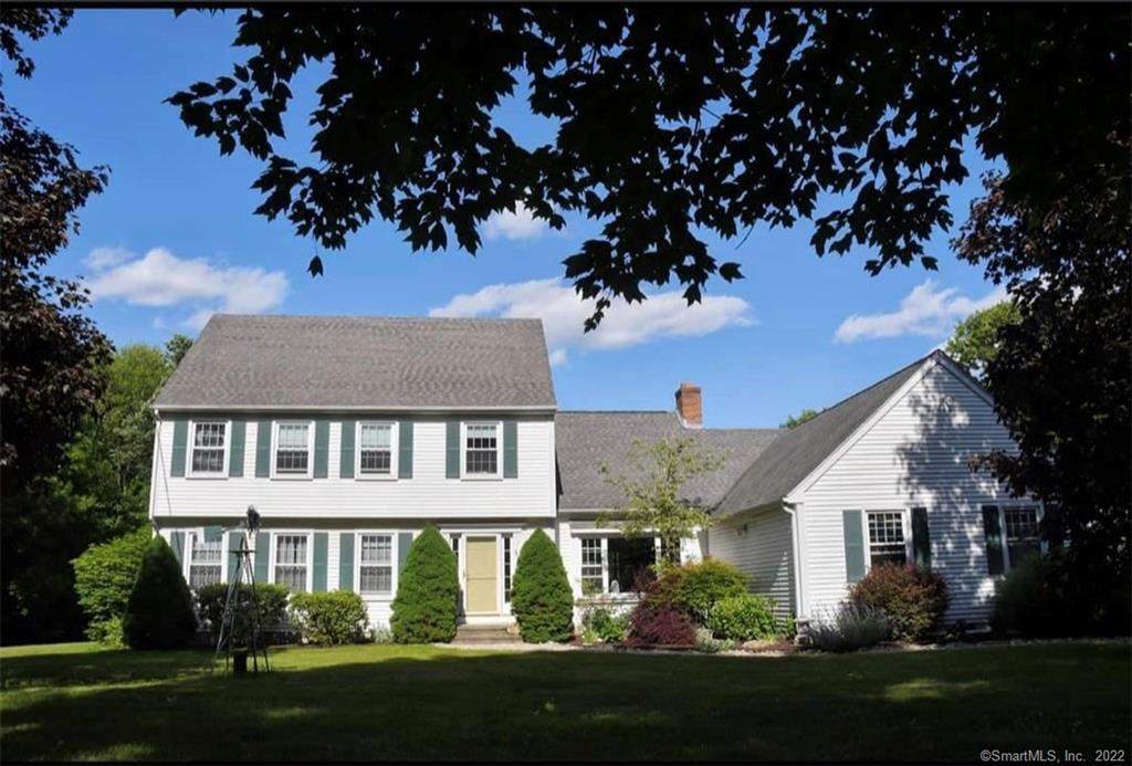 371 Tanner Marsh Road Guilford, CT 06437 - Photo 1 of 1 a front view of a house with a garden