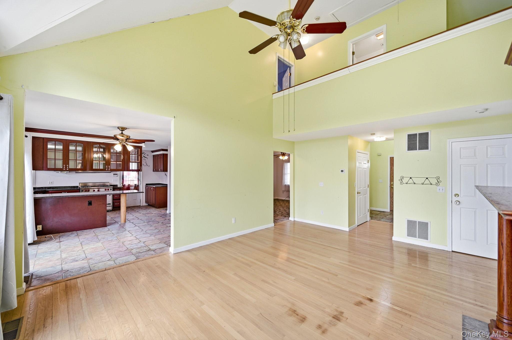 186 Violet Avenue Poughkeepsie, NY 12601 - Photo 21 of 50 a view of a kitchen and a cabinet a fireplace