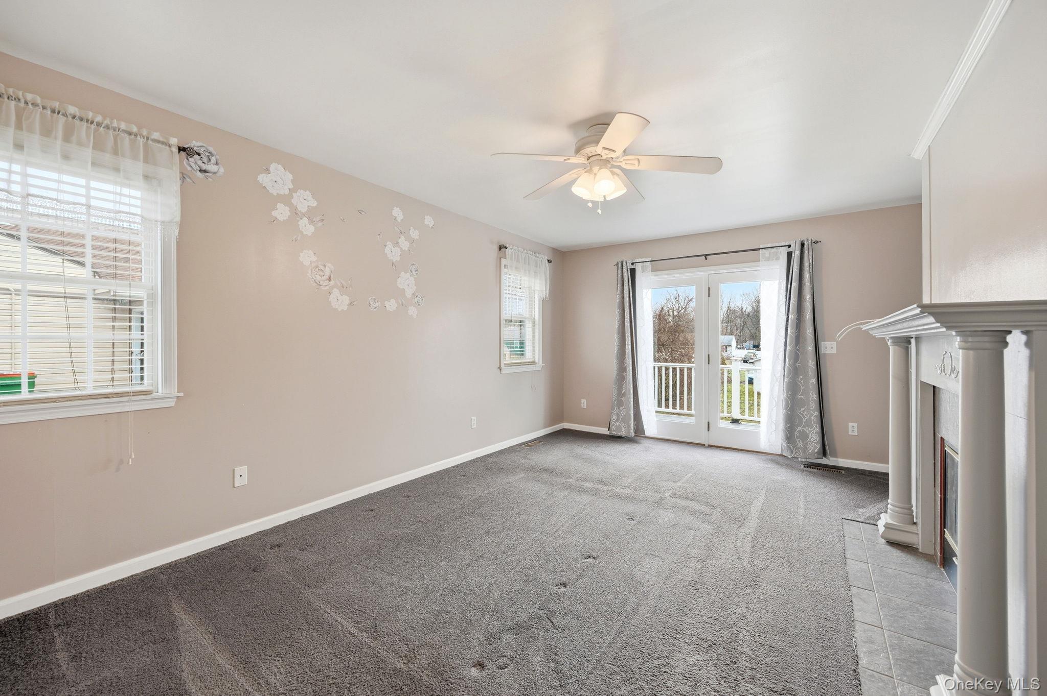 186 Violet Avenue Poughkeepsie, NY 12601 - Photo 28 of 50 a view of an empty room with a window