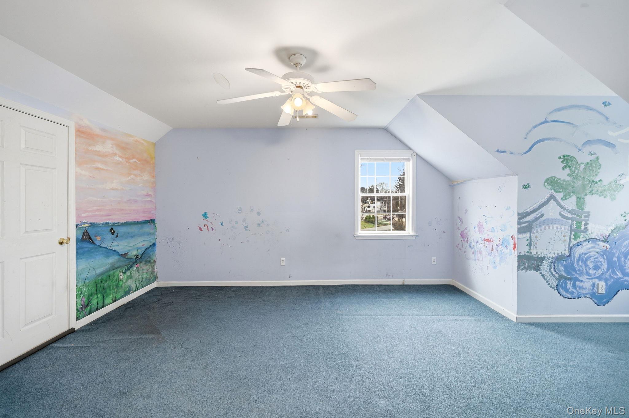 186 Violet Avenue Poughkeepsie, NY 12601 - Photo 36 of 50 a view of a livingroom with a ceiling fan and window