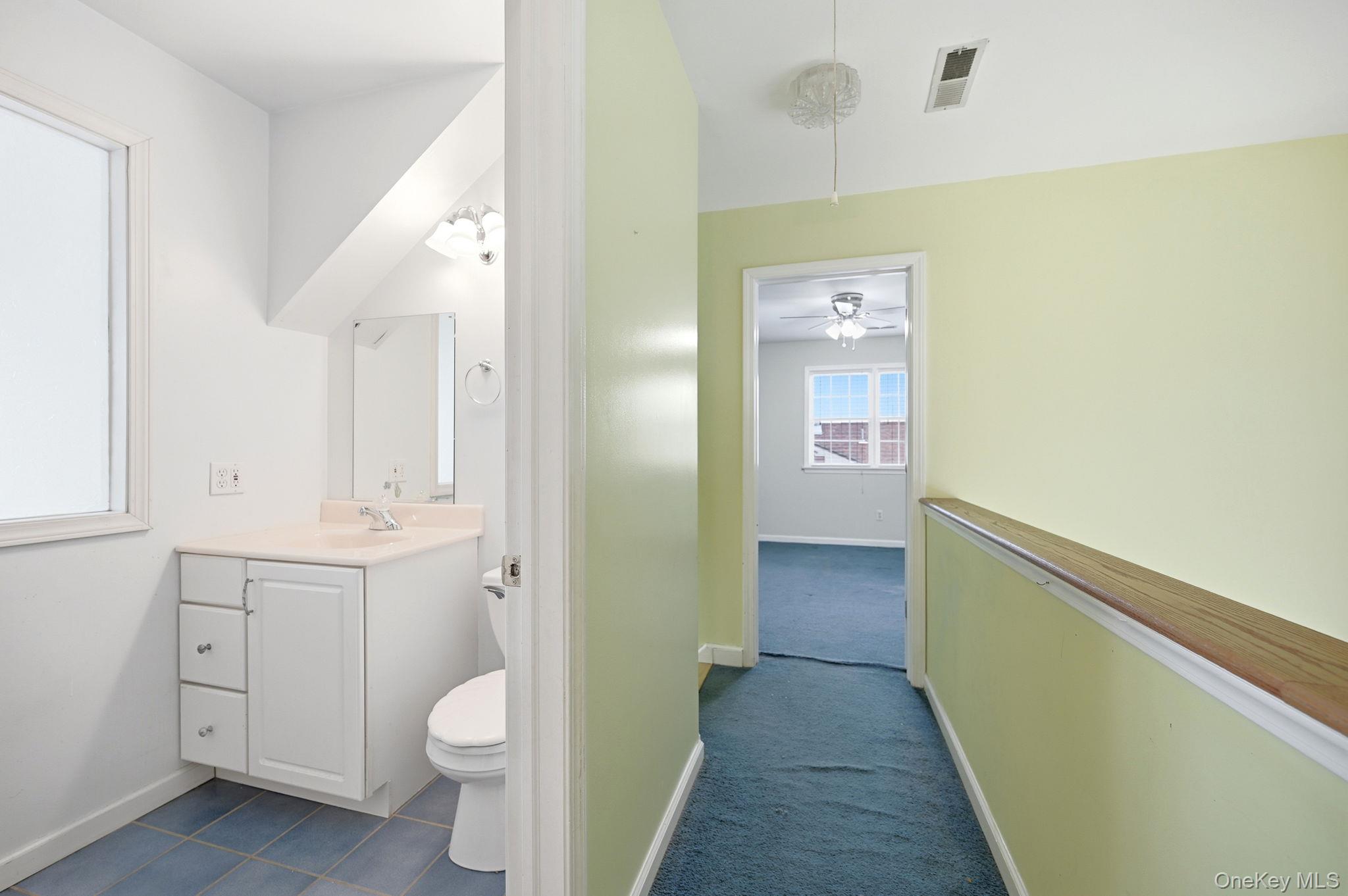 186 Violet Avenue Poughkeepsie, NY 12601 - Photo 39 of 50 a bathroom with a sink a toilet and shower