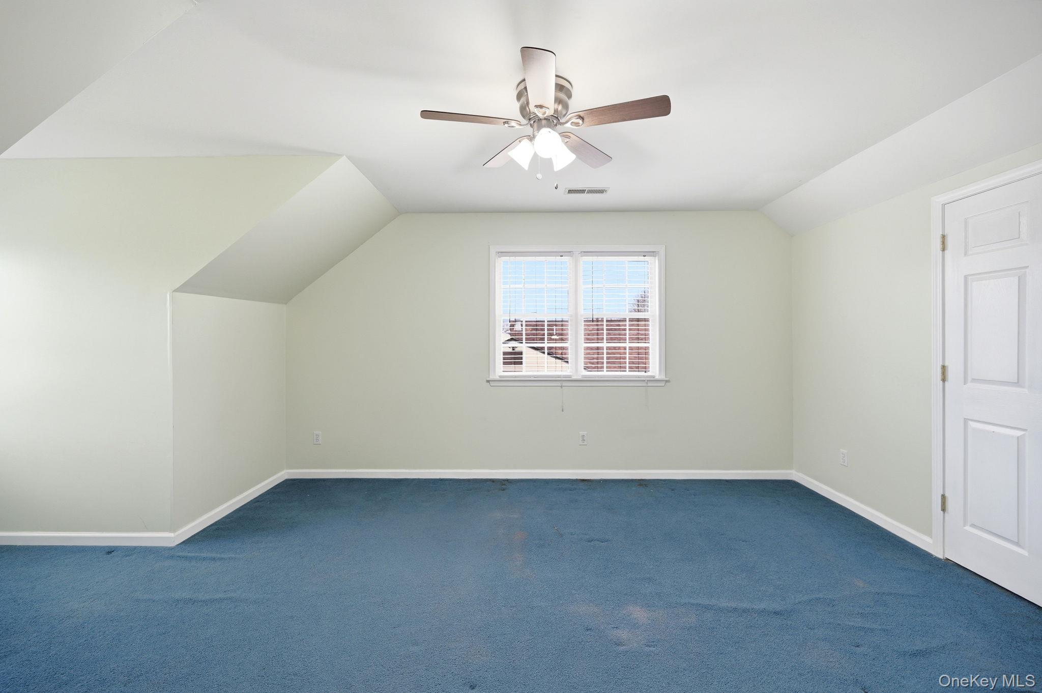 186 Violet Avenue Poughkeepsie, NY 12601 - Photo 42 of 50 an empty room with a window