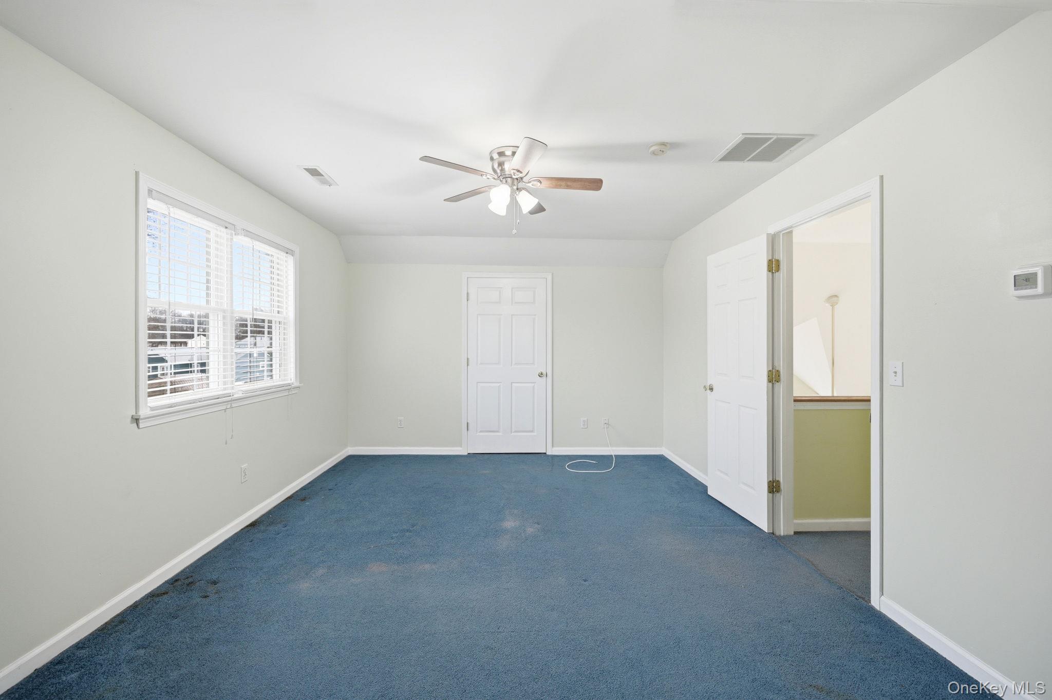 186 Violet Avenue Poughkeepsie, NY 12601 - Photo 43 of 50 a view of an empty room with a window