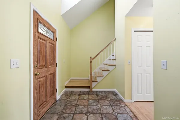 a view of a hallway with entryway