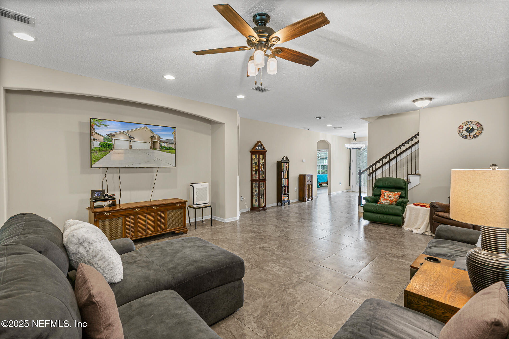 200 Ellsworth Circle St. Johns, FL 32259 - Photo 16 of 48 a living room with furniture and a flat screen tv