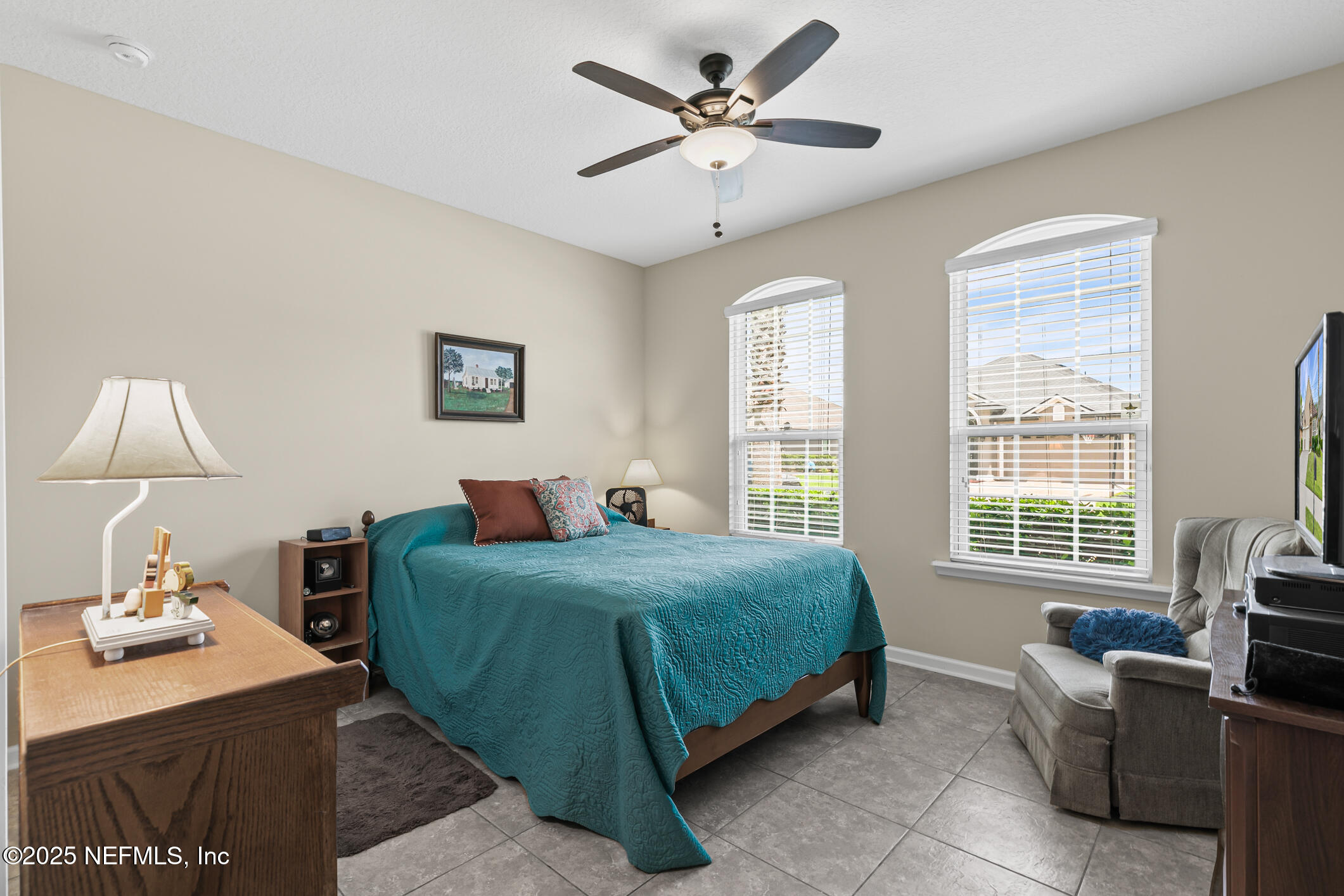 200 Ellsworth Circle St. Johns, FL 32259 - Photo 20 of 48 a bedroom with a bed a couch and a window