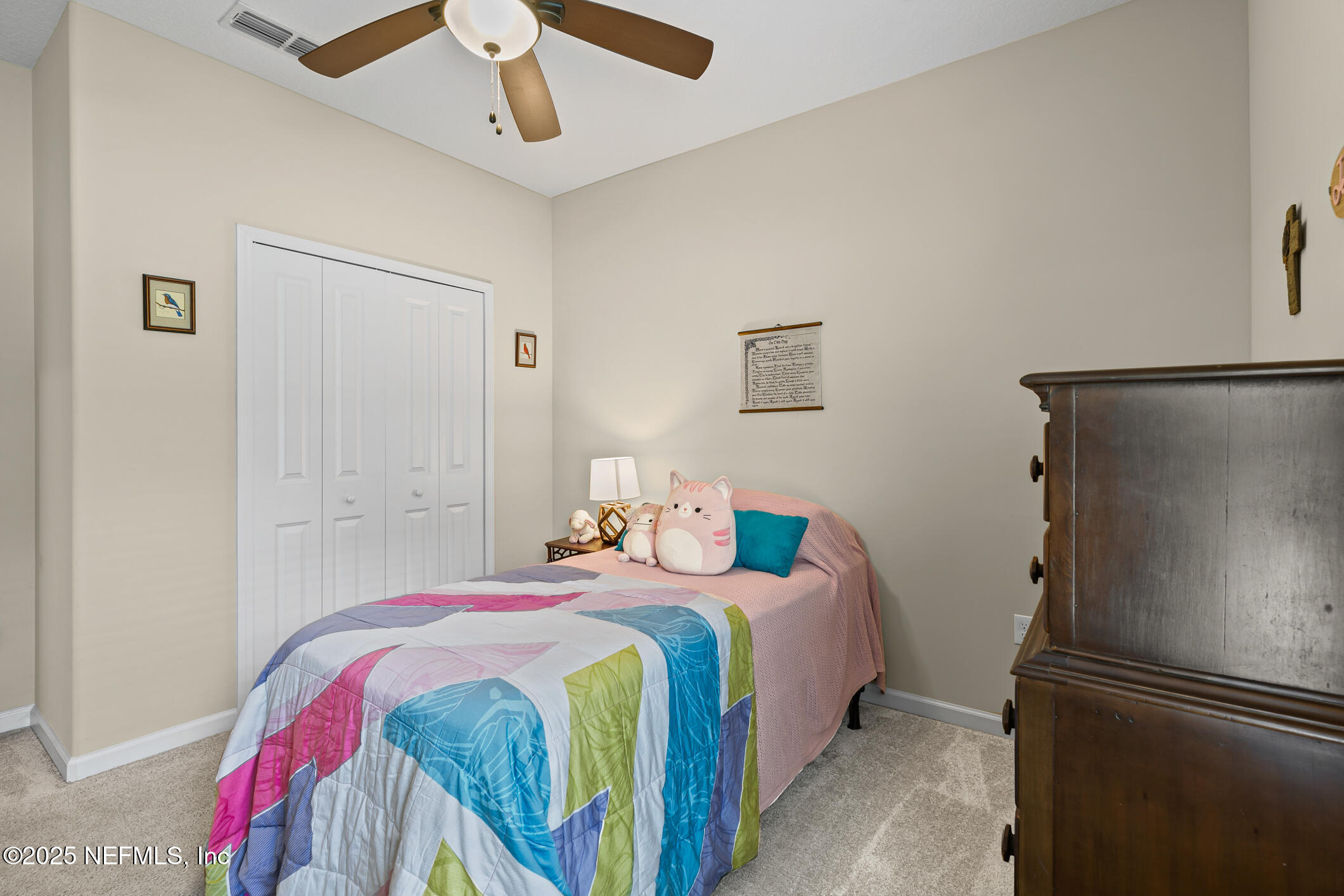 200 Ellsworth Circle St. Johns, FL 32259 - Photo 28 of 48 a bedroom with a bed and a refrigerator