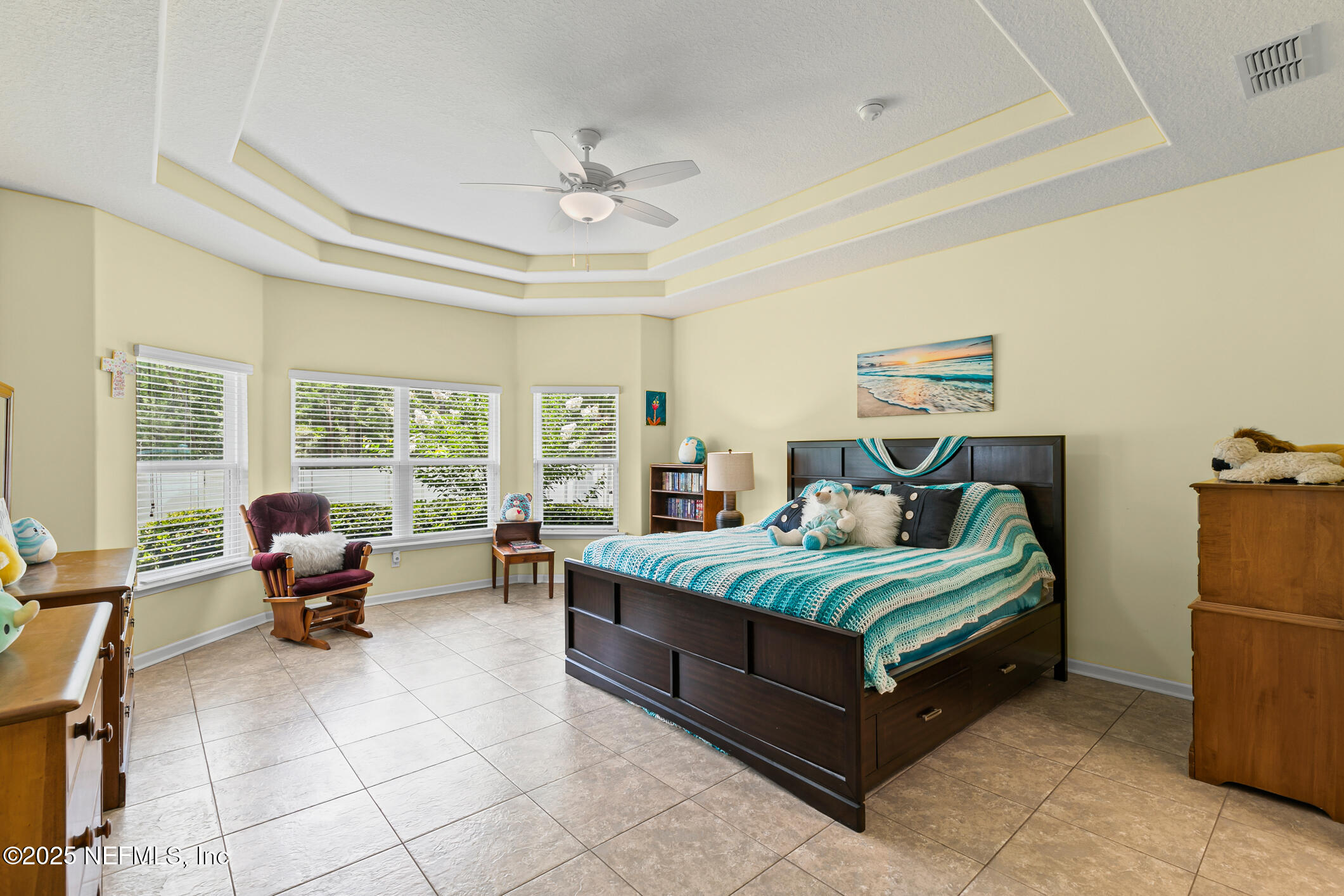 200 Ellsworth Circle St. Johns, FL 32259 - Photo 29 of 48 a bedroom with a bed and large windows