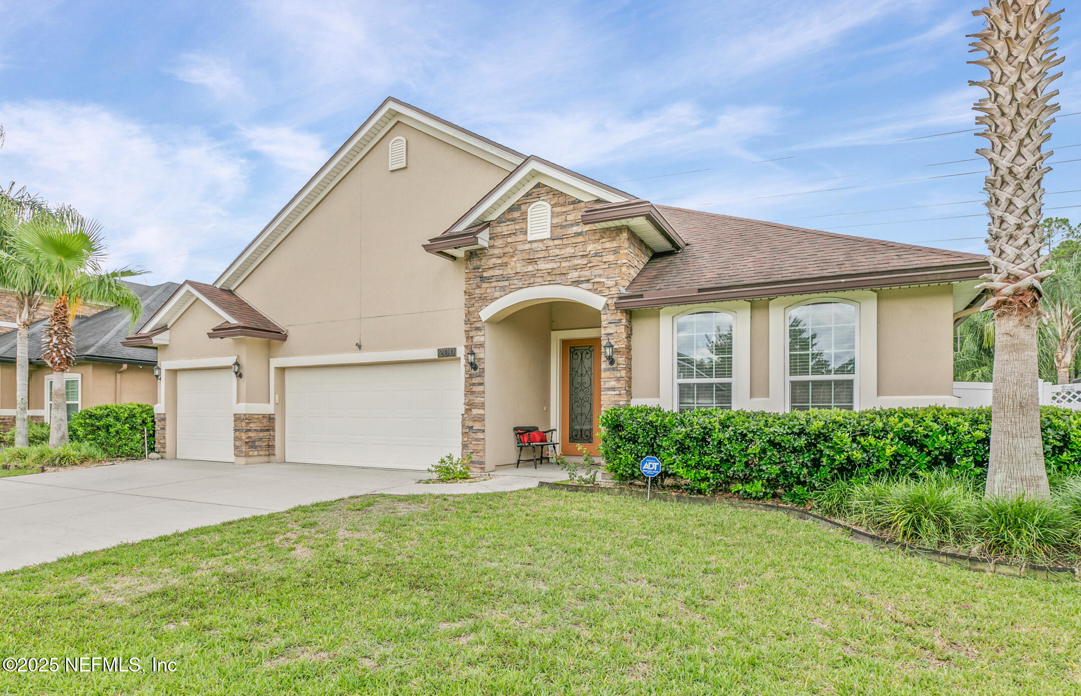 200 Ellsworth Circle St. Johns, FL 32259 - Photo 3 of 48 a front view of a house with garden