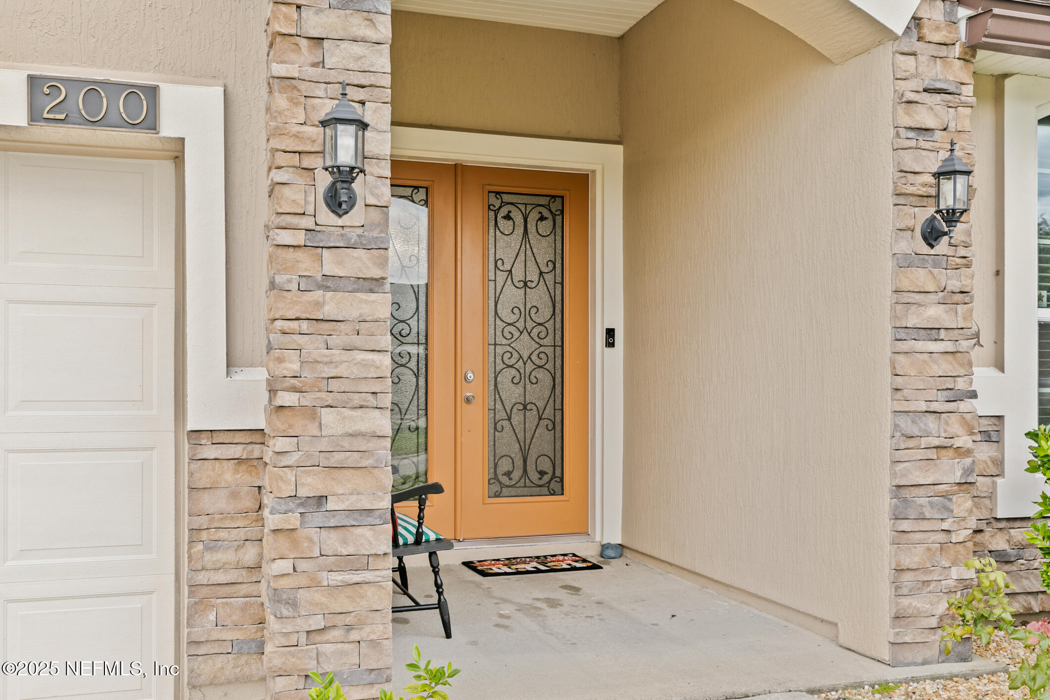 200 Ellsworth Circle St. Johns, FL 32259 - Photo 4 of 48 a door with brick wall and a window