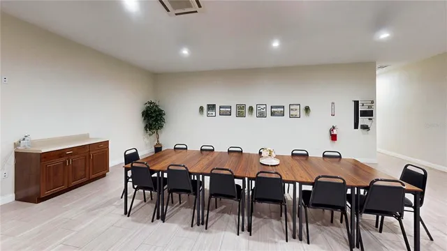 a view of a dining room with furniture