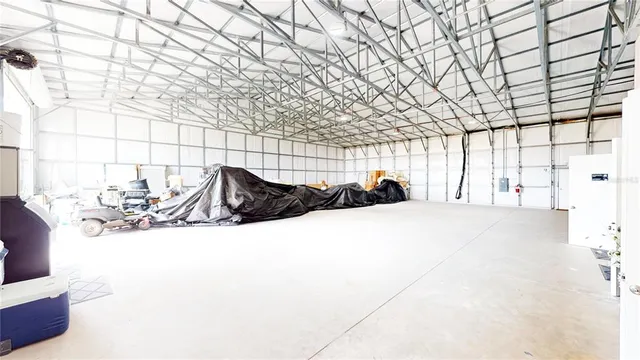 a view of empty room with large window